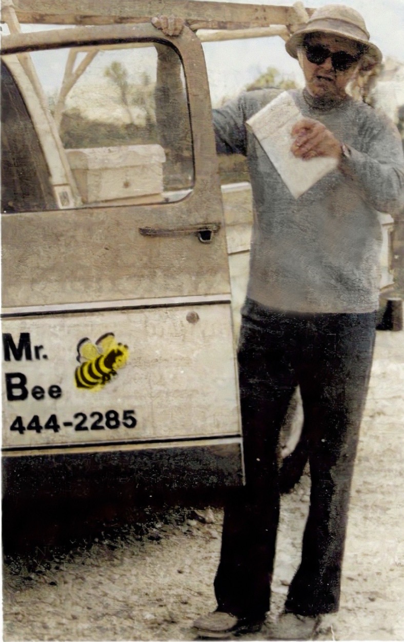 Ken Brugger by his Mr. Bee Truck