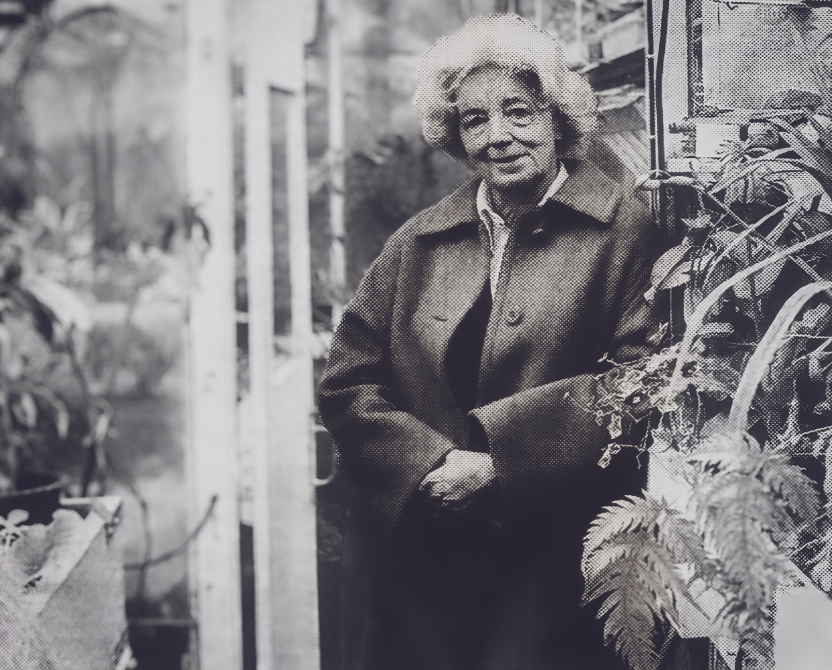 Frances Perry in her greenhouse