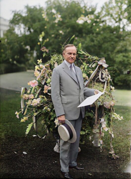 President Coolidge with a Birthday Wreath from the Florist Telegraphers Association