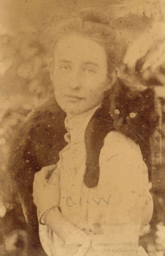 A young Charlotte Wheeler-Cuffe with her cat